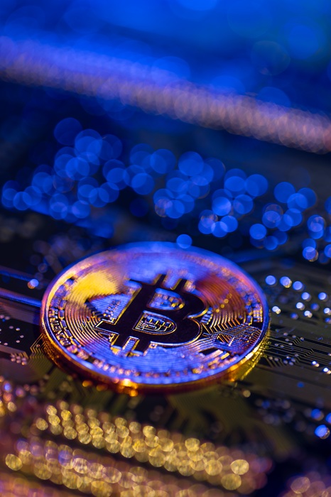 bitcoin coin close up on circuit board. finance concept. high quality photo